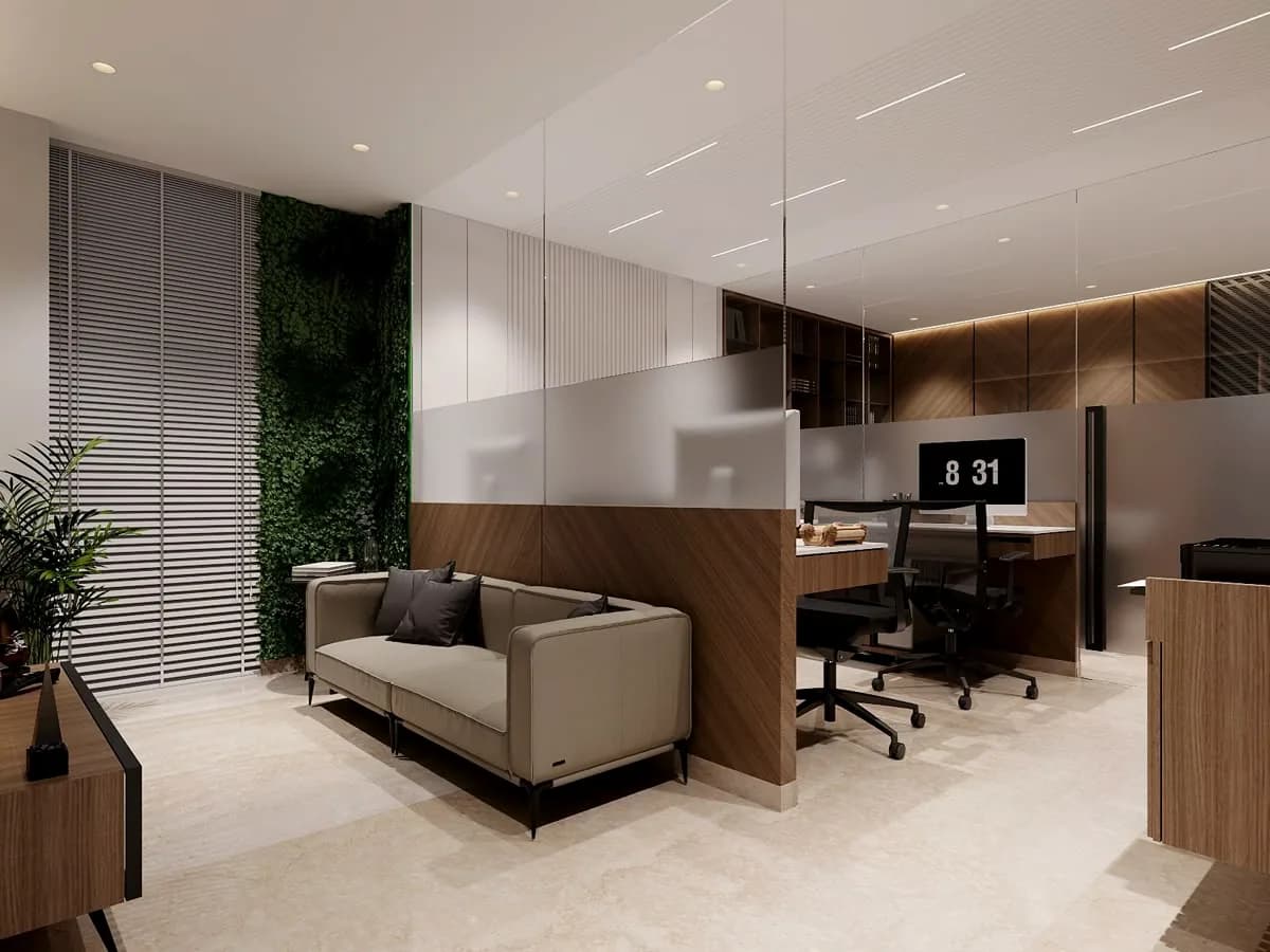 A sofa against a timber partition, a workstation behind frosted glass.