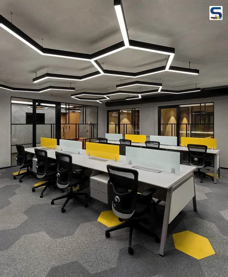 Reception desk against a panelled wall, seating to one side.